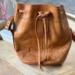 Tan Leather tooled vintage Bucket Bag Brand First Ten west